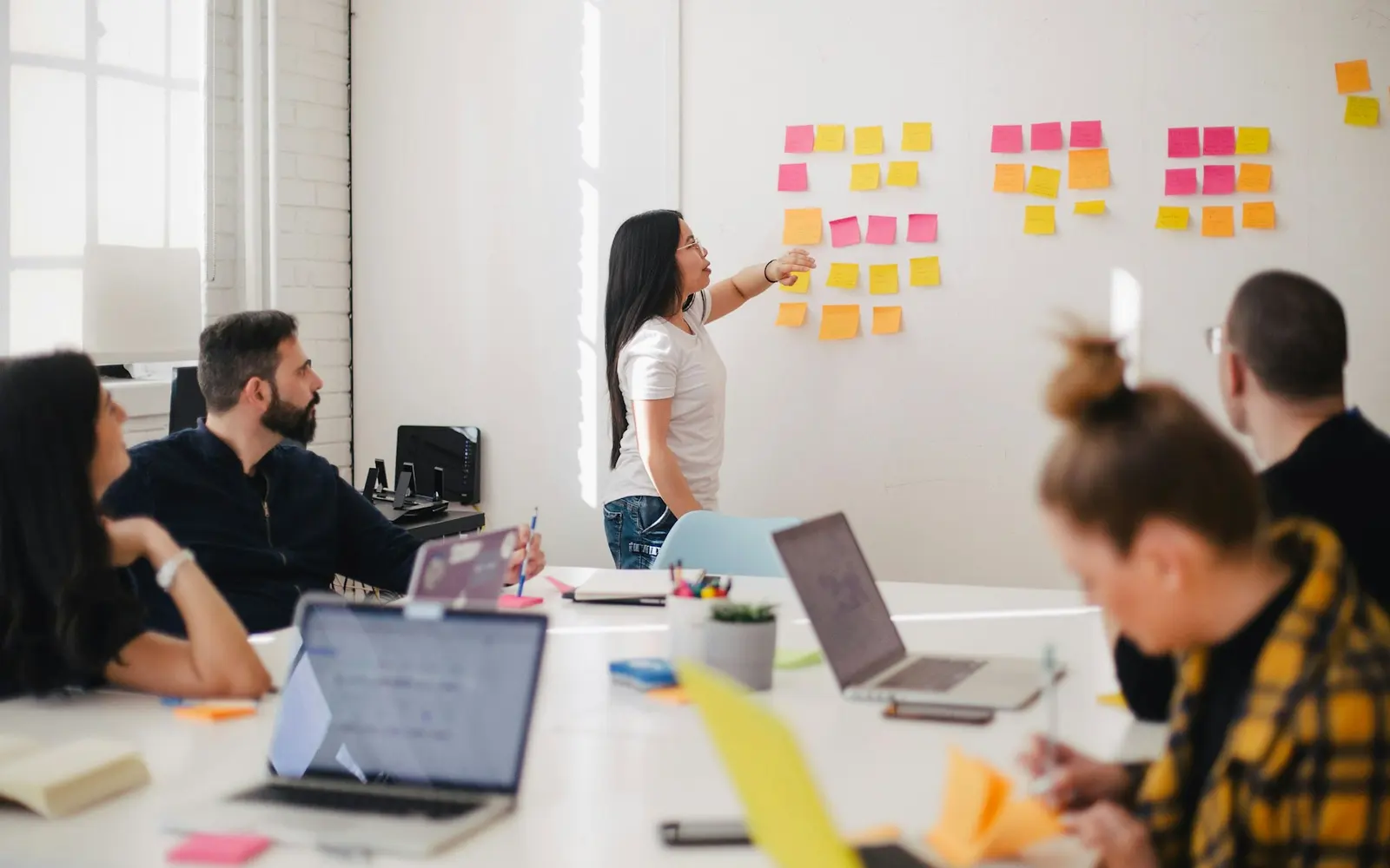Digital agency team collaborating in a strategy workshop