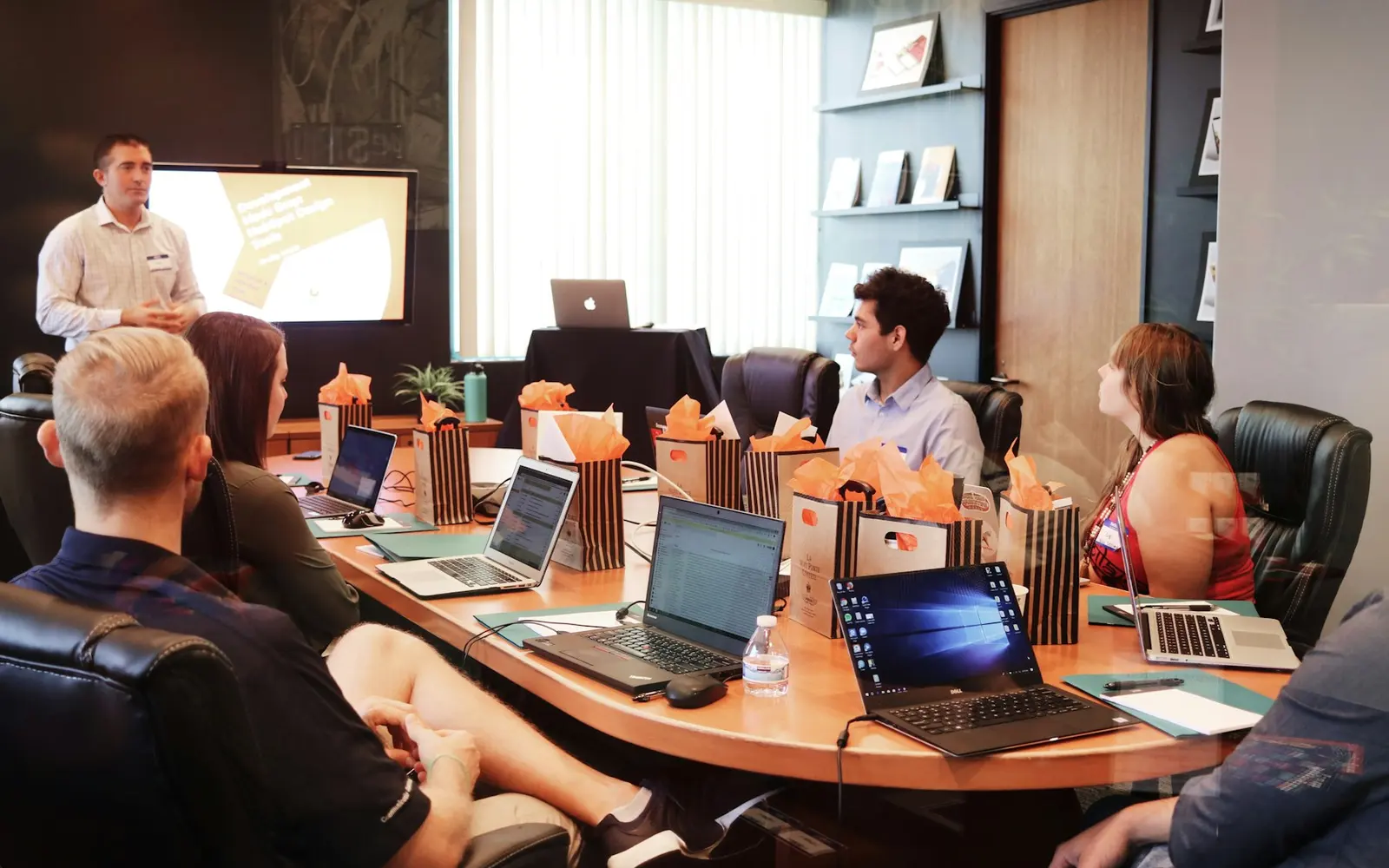 Creative brand strategy team reviewing digital assets